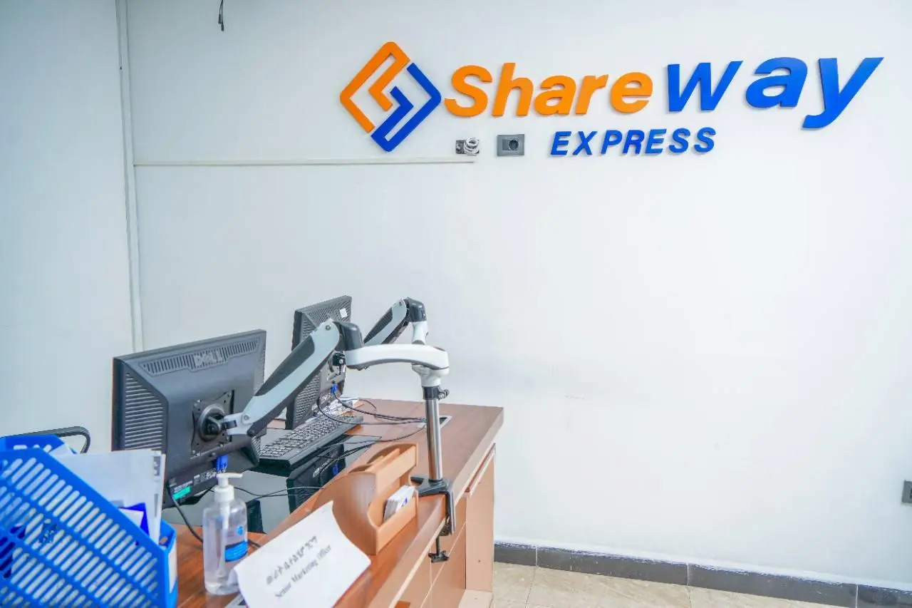 ShareWay Express front desk and office logo